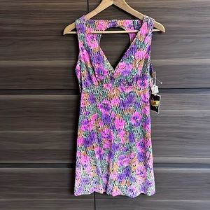 Deadstock amazing dress! 70-80’s acetate. Fits like a 4. Groovy baby!